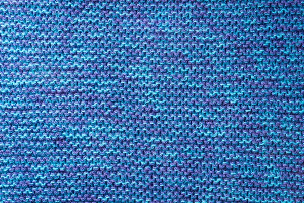 Синий вязаный фон. Вязание текстуры. Образец вязания . — стоковое фото