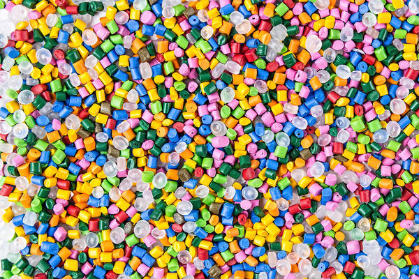 Polymeric dye. Plastic pellets. Colorant for plastics. Pigment in the granules. Polymer beads