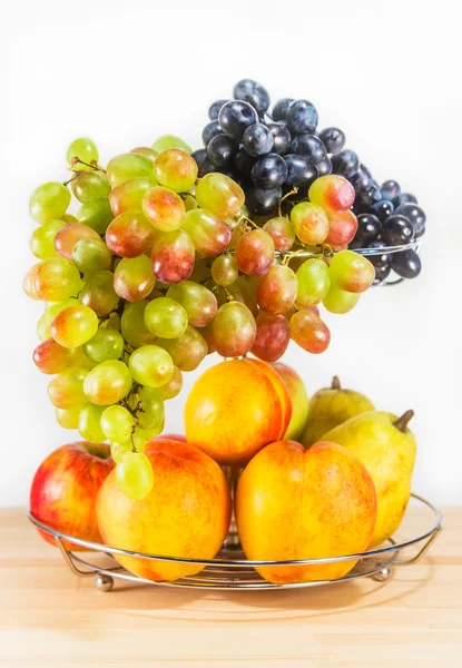 Fresh fruits on wooden table — Stock Photo, Image