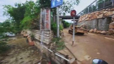 cooter drives along country ground road 