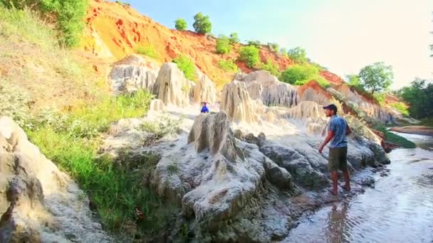 Father Watches Daughter Running on Stones by Fairy Stream — Stock Video