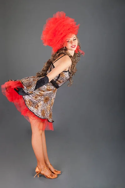 Brunette Girl in Bright Dress Poses in Studio