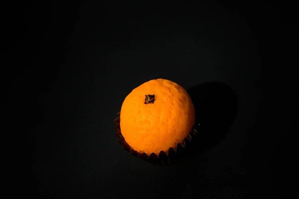 Small orange shaped candy made from marzipan — Stock Photo, Image