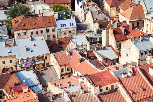 Aerial view of central part of old european city Lvov with age-old red city roofs