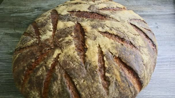 Zoom Big Whole Homemade Black Rye Bread Interesting Texture Surface — Stock Video