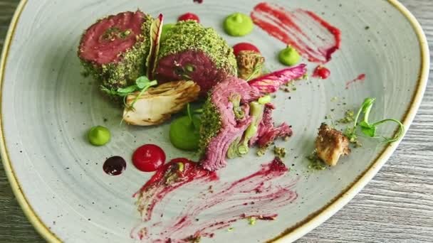 Zoom out from half-eaten exquisite semi-raw meat restaurant dish — 비디오