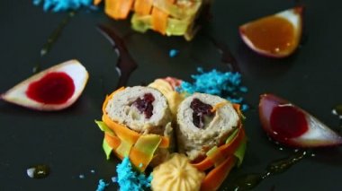 closeup panorama up at trendy decorated vegetable rolls stuffed with minced meat