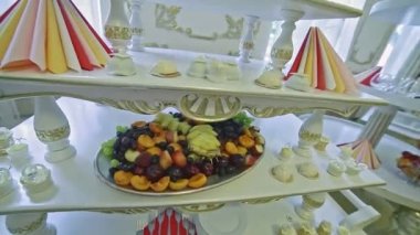 quick panorama on assorted sliced fruits on wedding reception