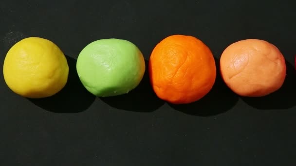 Top view closeup panorama on small pieces of colored homemade marzipan — 图库视频影像