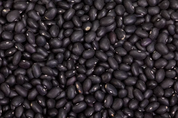 Фон из чёрных бобов — стоковое фото