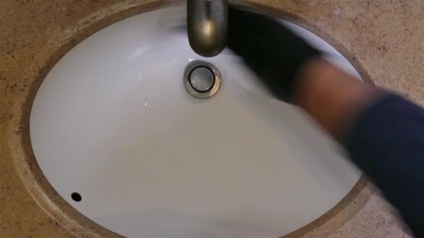 Hand Gloves Cleaning Restroom Sink Rug Bleach — Stock Video