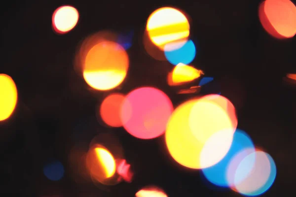 Christmas multicolor bokeh. Bakgrund med oskärpa lampor. — Stockfoto