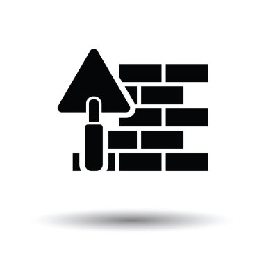 Icon of brick wall with trowel clipart
