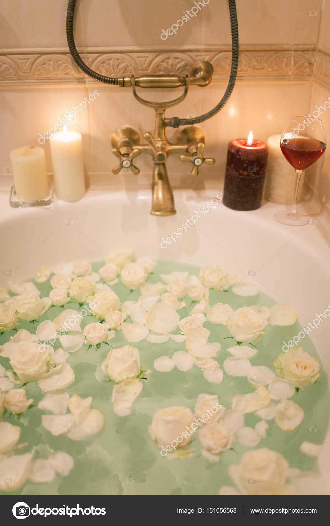 Take a bath with rose petals and candles. Romantic evening in th Stock  Photo by ©april_89 151056102