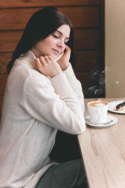 Beautiful Woman With Cup of Tea or Coffee 