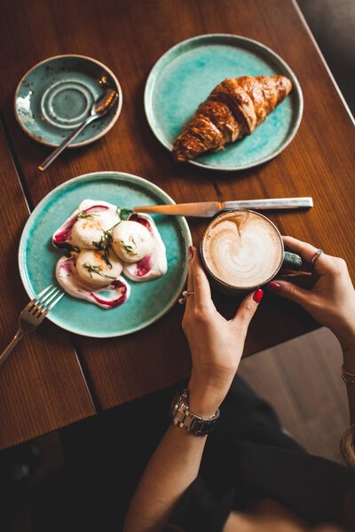 Curd breakfast. Cheesecakes with jam and sour cream, croissant a