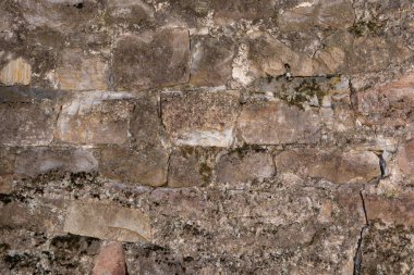 Taş duvarın dokusu. taş ve çimentodan eski bir duvar. Metin için yer