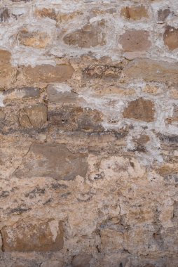 Eski duvar taştan yapılmıştır. Doku ve arka plan. Metin için yer