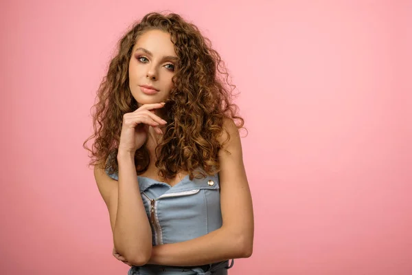 Closeup studio portrait of pretty girl with long curly hair — Stock Photo, Image