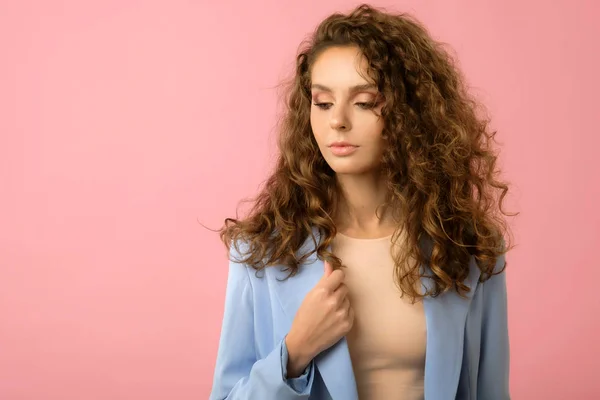 Closeup studio portrait of pretty girl with long curly hair — Stock Photo, Image