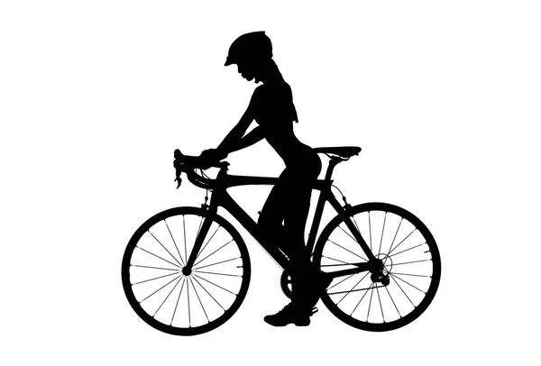Silueta de una mujer desnuda con una bicicleta . — Foto de Stock