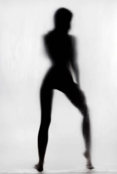 Silhouette of a naked woman — Stock Photo, Image