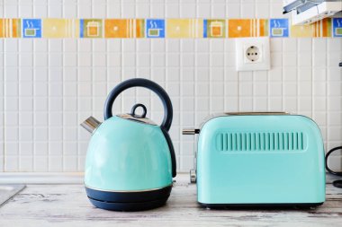 Toaster and electric kettle on the kitchen