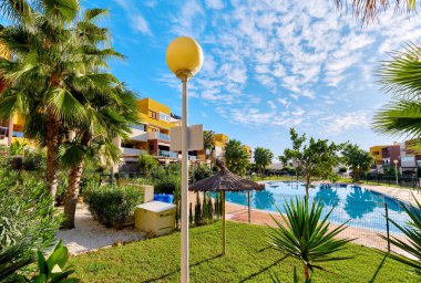  Exterior of modern style new apartments with swimming pool cozy area