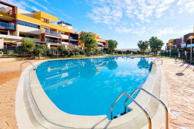 Exterior of modern houses with swimming pool
