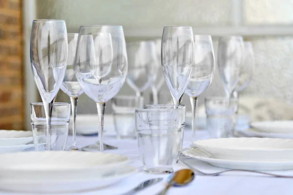 Close New Diverse Glassware Porcelain Plates Served White Tablecloth People — Stock Photo, Image