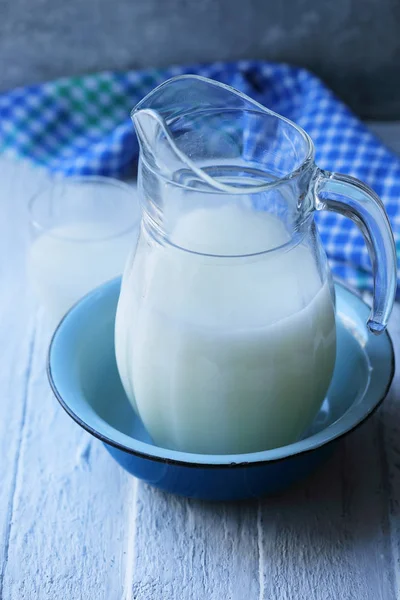 Whey in a glass jug — Stock Photo, Image