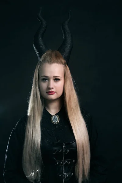 Woman with horns — Stock Photo, Image