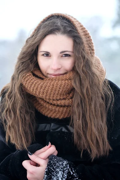 Woman in a knitted scarf — Stock Photo, Image