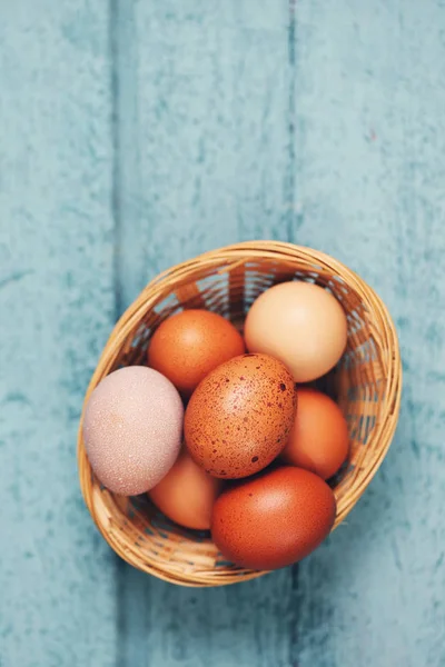 raw eggs in basket