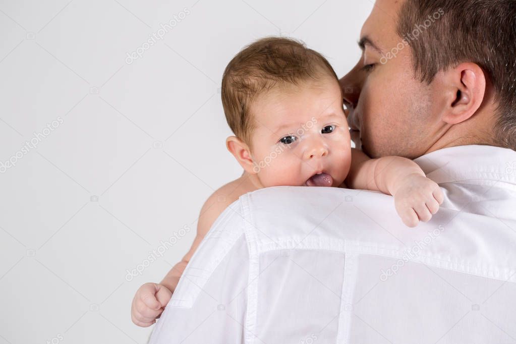 Father kisses baby
