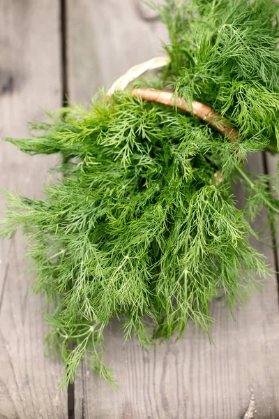dill on the wooden background