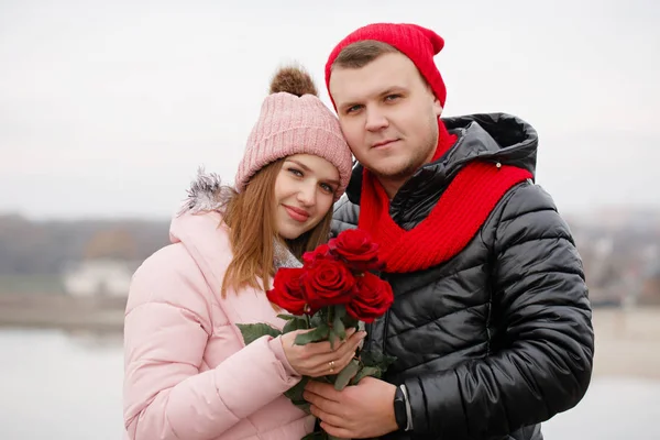 Tender couple with flowers — Stock Photo, Image