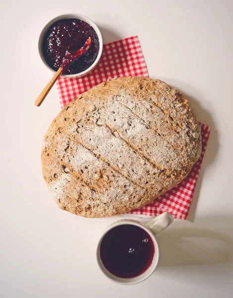 Home made bread with raspberry jam and coffee cup - Flat lay — Φωτογραφία Αρχείου