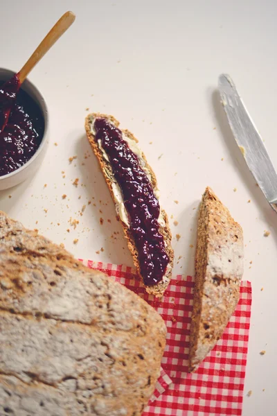 Home made bread with raspberry jam and coffee cup - Flat lay — Φωτογραφία Αρχείου
