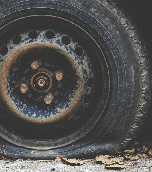 Flat car tyre — Stock Photo, Image