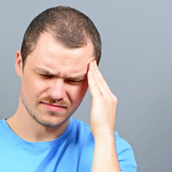 Portrait of a man suffering from headache — Stock Photo, Image