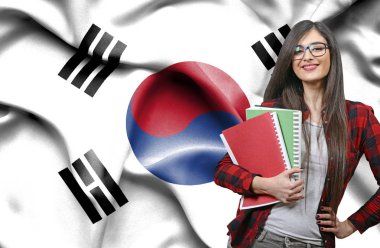 Mutlu kız öğrenci holdimg kitaplar Sout ulusal bayrak karşı