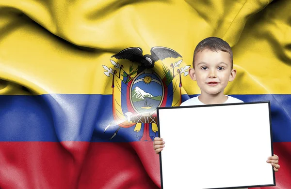 Cute small boy holding emtpy sign in front of flag of Ecuador — Stock Photo, Image