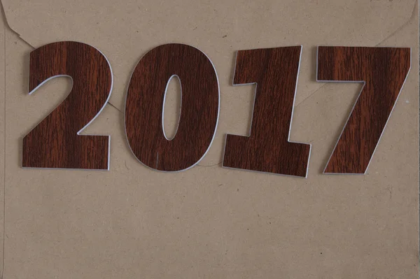 Signo símbolo del número 2017 en el viejo estilo retro vintage de madera b — Foto de Stock