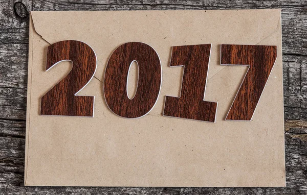 Signo símbolo del número 2017 en el viejo estilo retro vintage de madera b — Foto de Stock