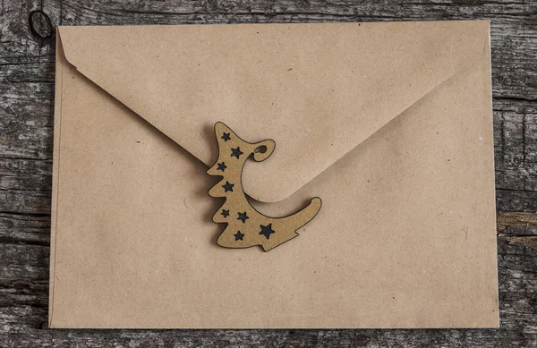 Envelope on wooden background — Stock Photo, Image