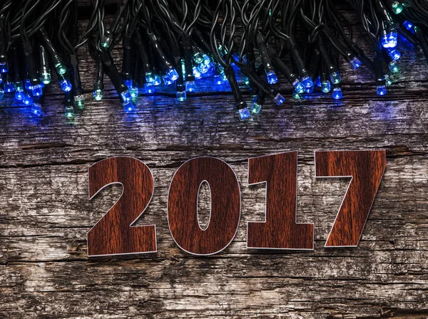 Feliz Año Nuevo 2017 sobre fondo de madera — Foto de Stock