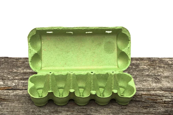Caja de huevo vacía, cartón abierto y verde — Foto de Stock