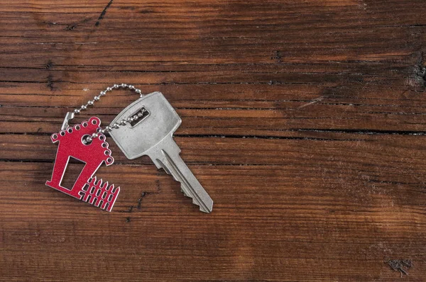 Símbolo da casa com chave de prata — Fotografia de Stock