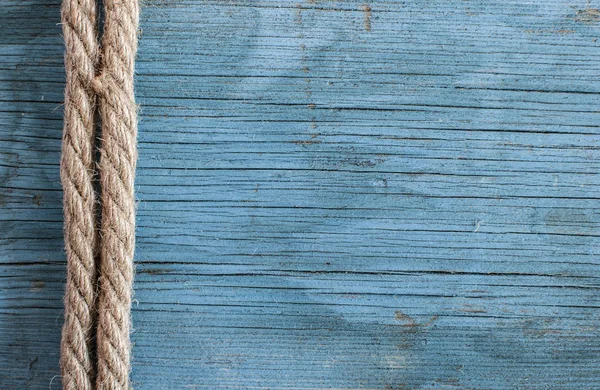 Ship rope on wooden background — Stock Photo, Image